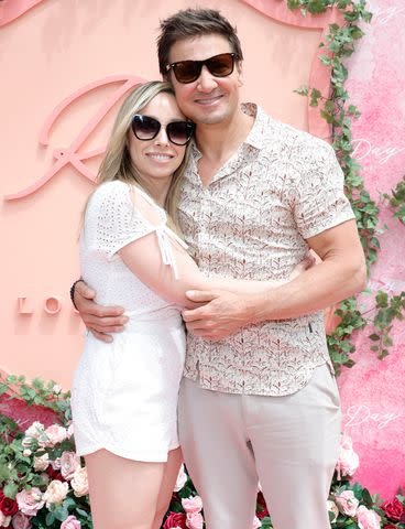 <p>Stefanie Keenan/Getty</p> Kym Renner and Jeremy Renner