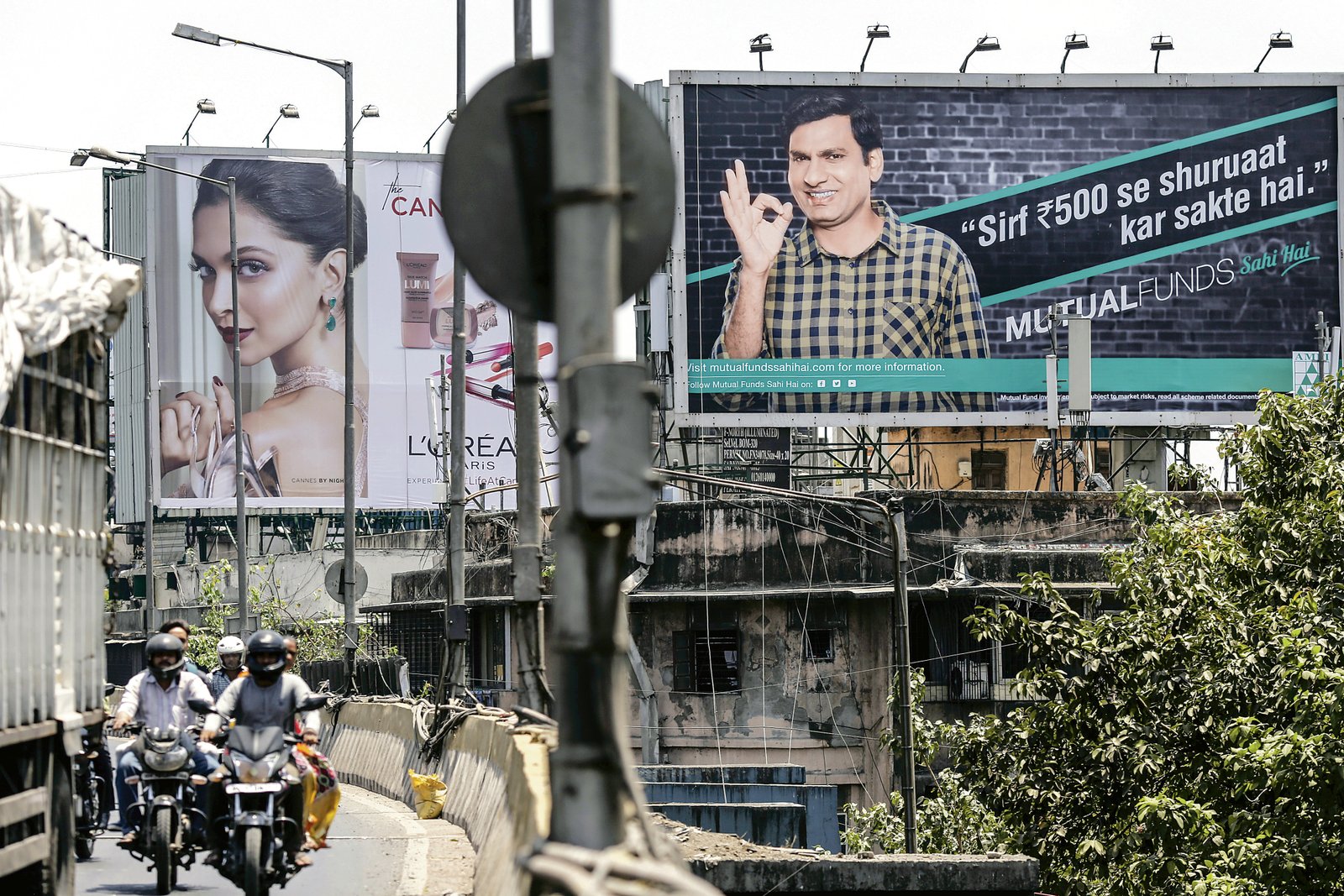 A file photo of a hoarding displaying the mutual fund sahi hai ad campaign near a highway in Mumbai. The Association of Mutual Funds in India launched the campaign in 2017.  (Bloomberg)