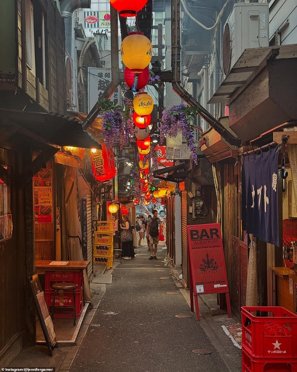 The last slide showed a city's alley peppered with Asahi lanterns and crates near the Bar Albatross