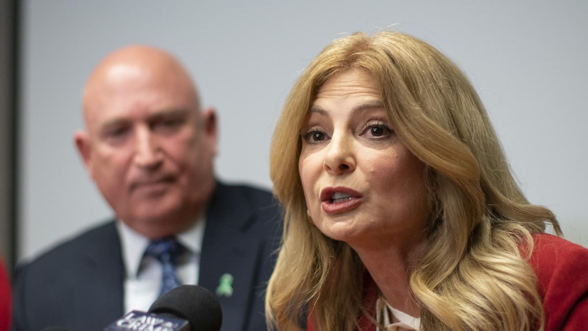 Lisa Bloom speaking at press conference