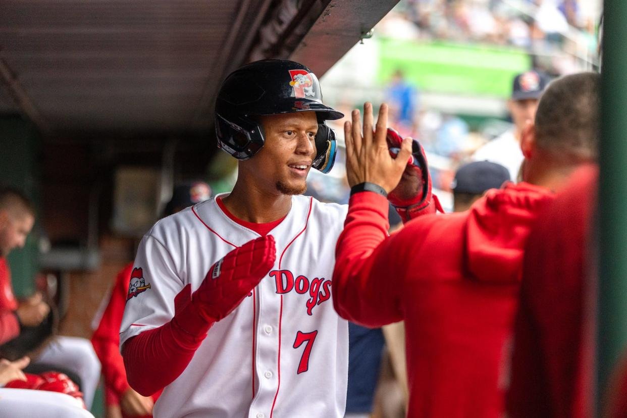 Kristian Campbell dishes out high fives during a Portland Sea Dogs game earlier this season. The No. 5 ranked prospect in the Boston Red Sox organization was promoted to Triple-A Worcester on Tuesday.