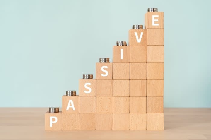 Wooden blocks arranged in a growth pattern with the word passive written on the side.