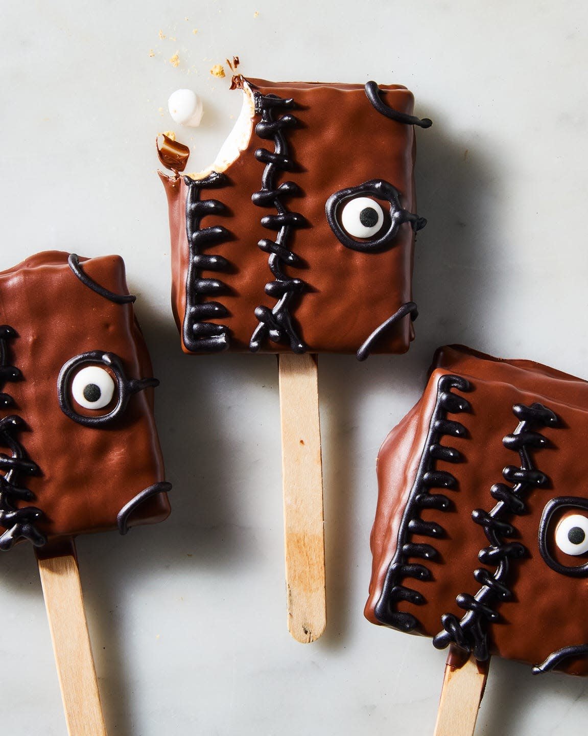 chocolate pops with candy eyes