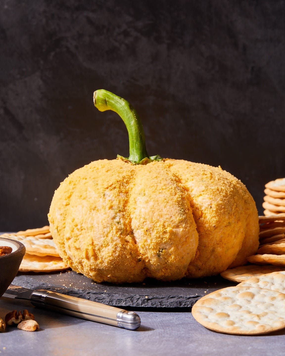 pumpkin cheese ball with crackers