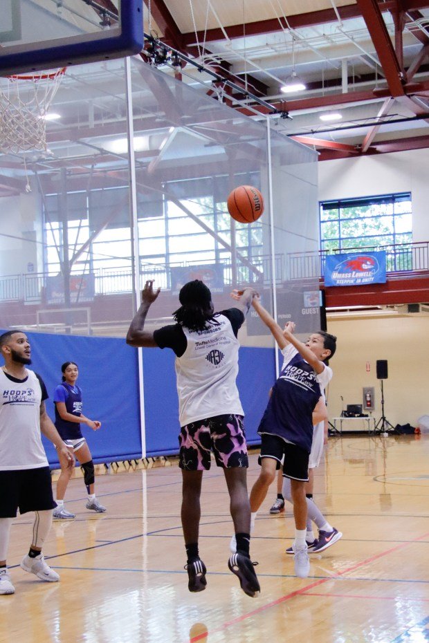 Jaxon Lemerise, of Northboro, shoots for a basket during the...