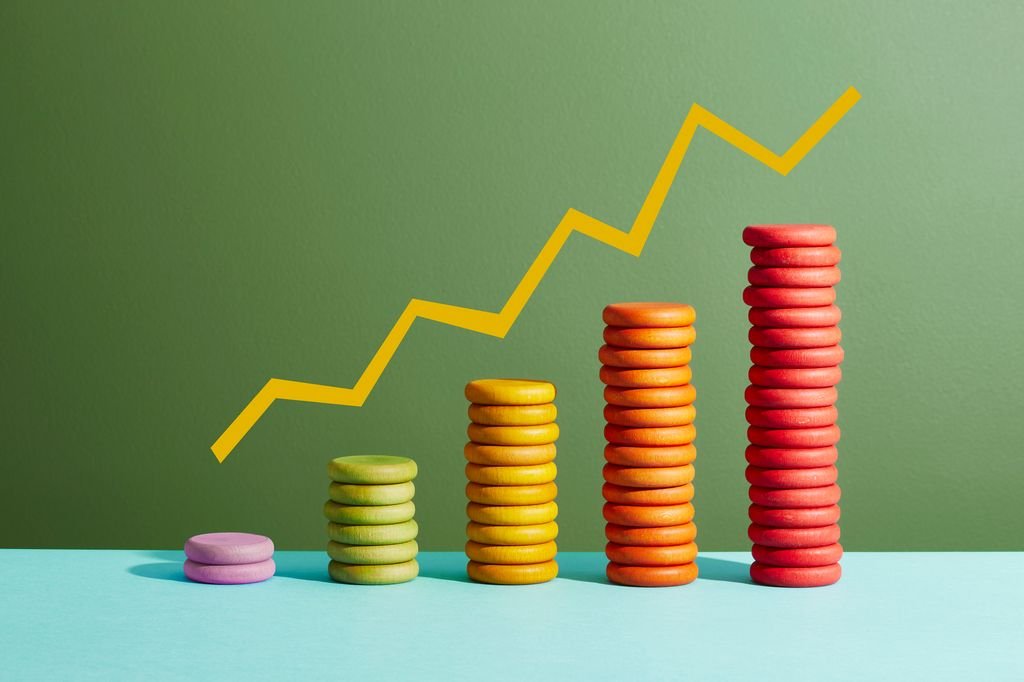 Coins arranged as a bar chart with a graph line above
