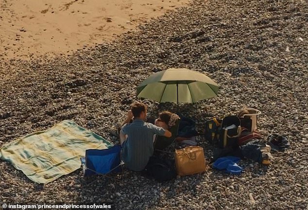 A young couple were seen relaxing on a pebbled beach during one moment in the social media post