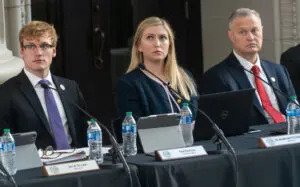 From left, now-former UNL Student Regent Paul Pechous and Regents Elizabeth O’Connor of Omaha and Rob Schafer of Beatrice. Oct. 5, 2023. (Zach Wendling/Nebraska Examiner)