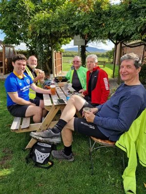Some of the cyclists pause for refreshments along the 75km route.