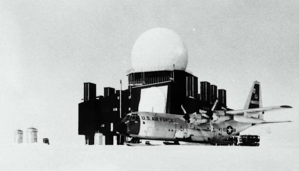 A Distant Early Warning (DEW) radar installation in Greenland is supplied by an LC-130 from the 17th Tactical Airlift Squadron of the Alaskan Air Command based at Elmendorf Air Force Base, sometime before 1972. <em>U.S. Air Force</em>