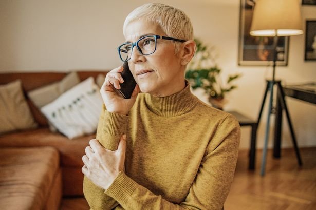 A woman checks her finances