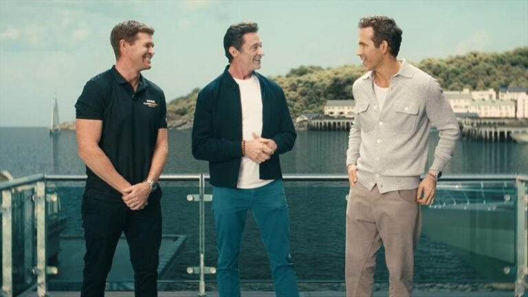 Hugh Jackman and Ryan Reynolds cheer on the BONDS Flying Roos