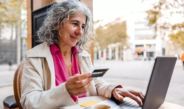 A woman checks her finances