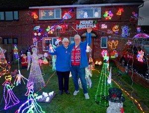 Bryan and Tina Williams from Shawbury, who have filled their front garden with Christmas lights to raise money for Hope House