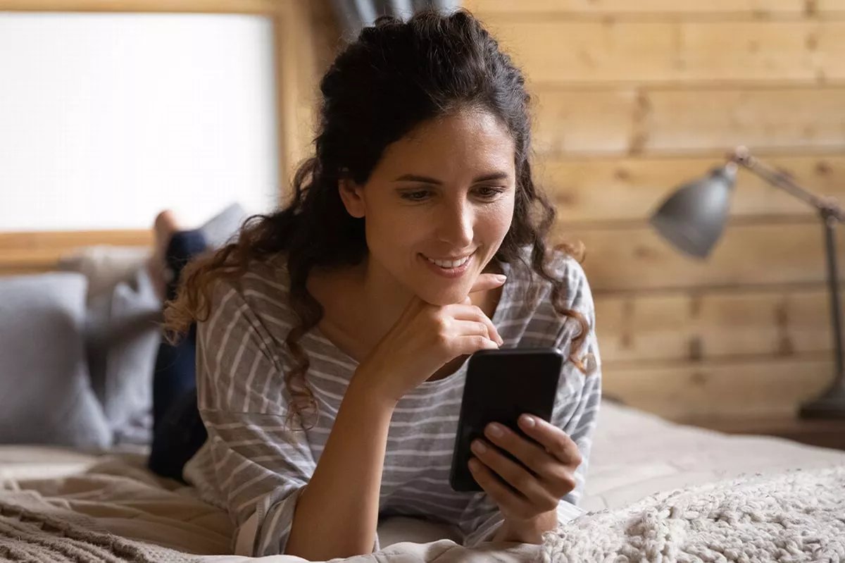 A woman checks over her finances