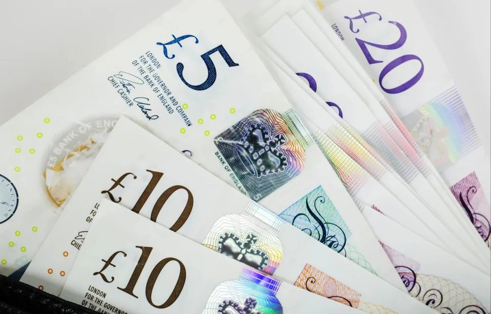 British banknotes in a wallet.