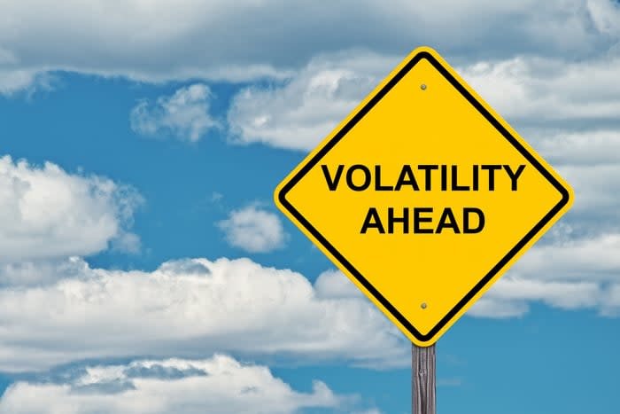 Road sign with volatility ahead.