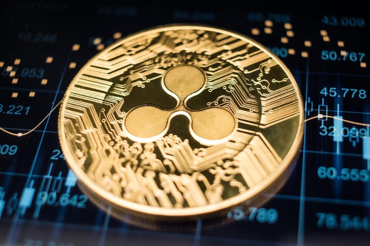Golden Ripple XRP Coin on Futuristic Digital Technology Background