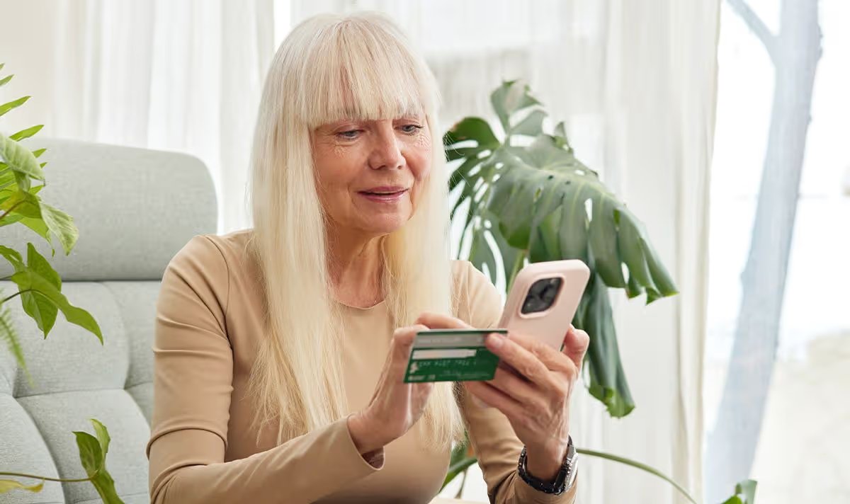 A woman checks her finances