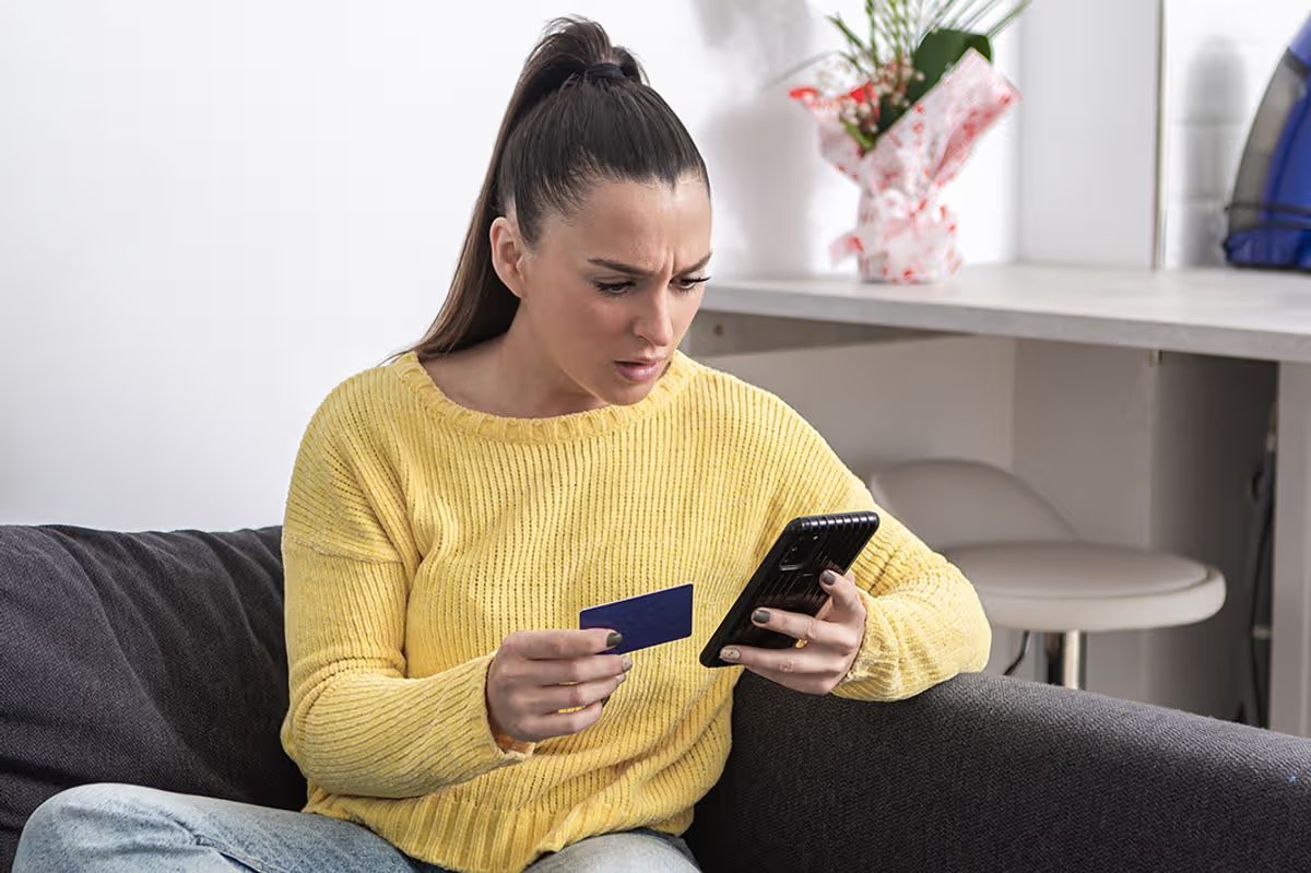 A woman checks her finances