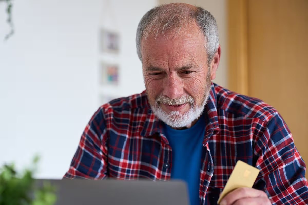 A man checks his finances