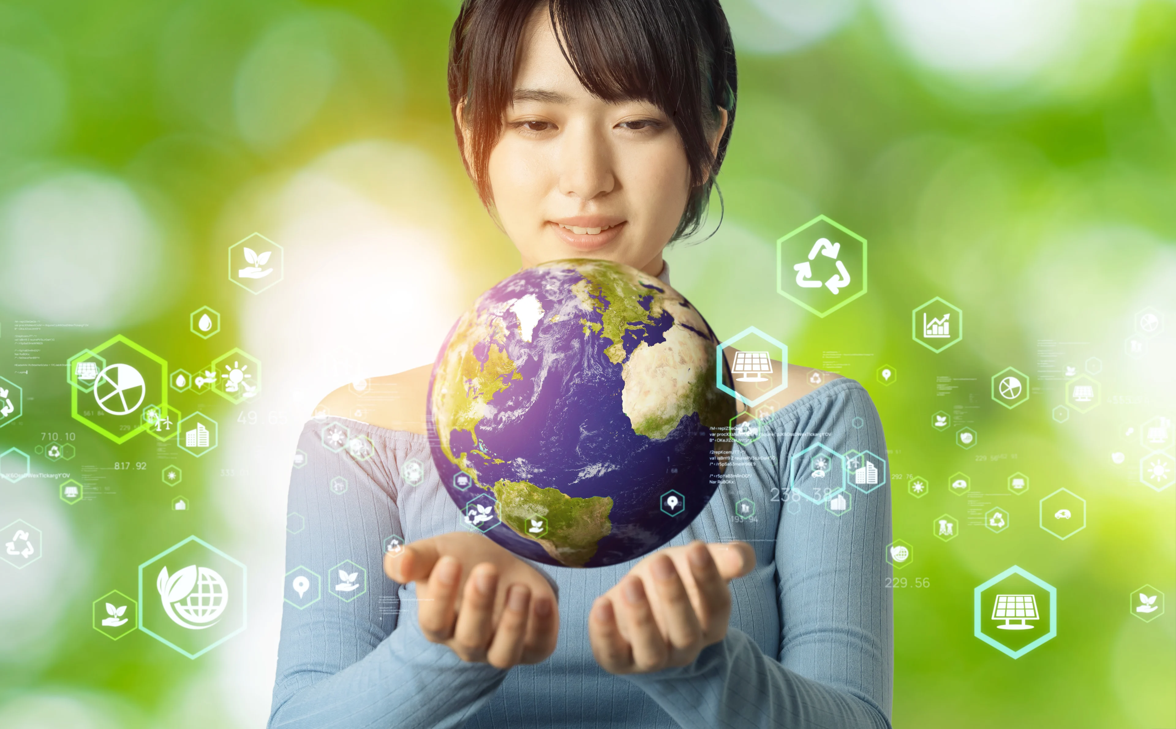 Someone has a globe hovering over their outstretched hands.