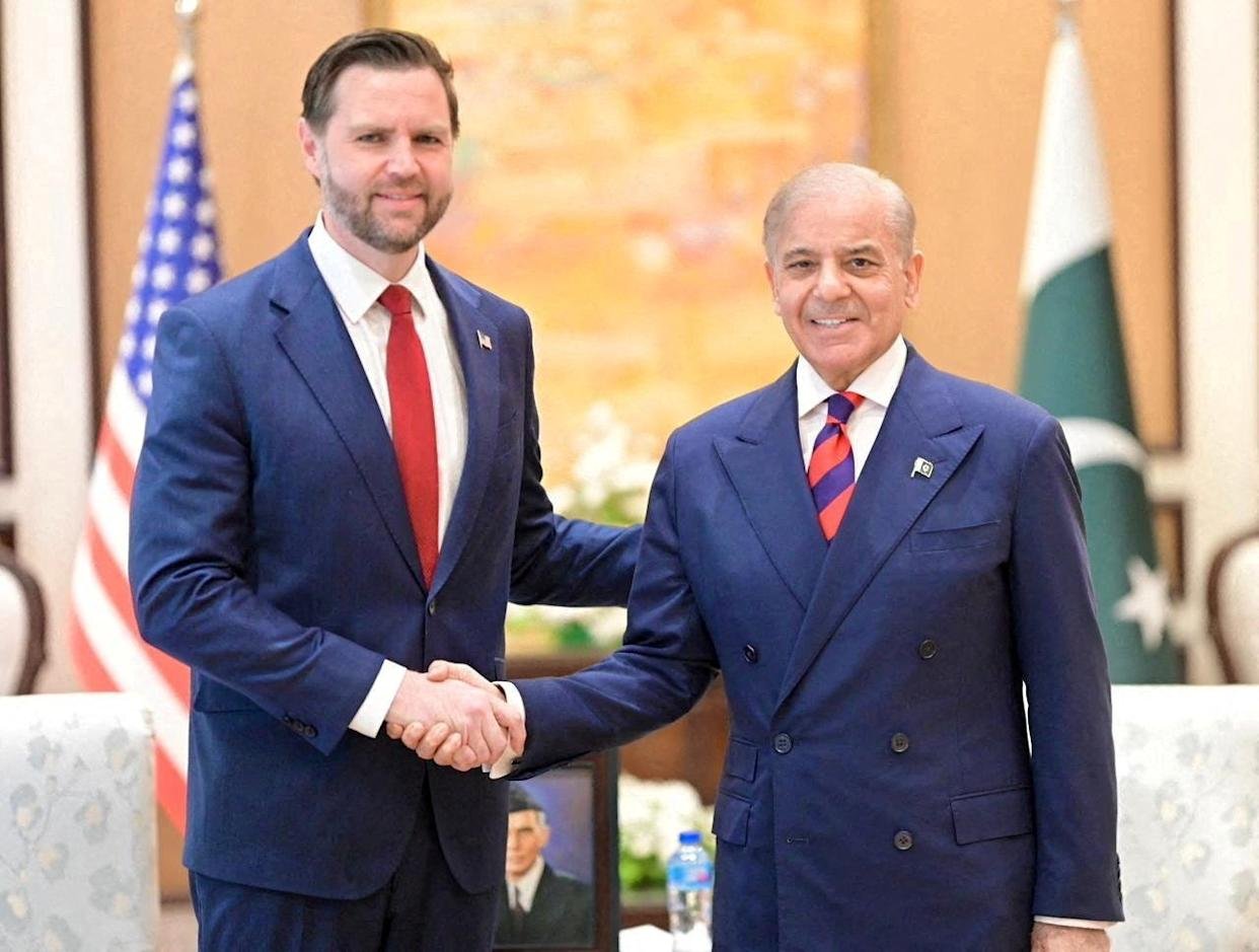 Pakistan's Prime Minister Shehbaz Sharif shakes hands with U.S. Vice President JD Vance during their meeting, on the day delegations from the United States and Iran are to hold peace talks, in Islamabad, Pakistan, April 11, 2026.