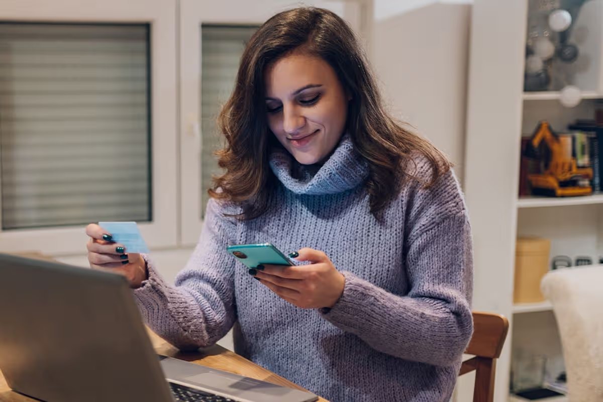 A woman checks her finances