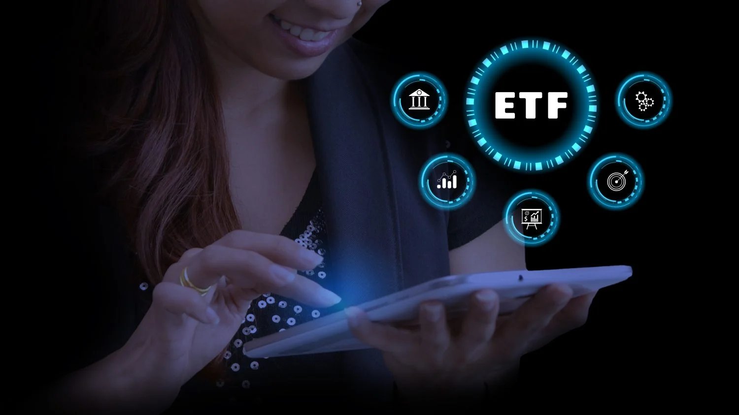 A person with long brown hair, smiling subtly, holds a glowing white tablet with both hands, their right index finger touching the screen. Above the tablet, a cluster of bright blue circular digital icons floats in a dark void. The central and largest icon prominently displays 'ETF' in white text. Surrounding it are smaller icons depicting a bank building, a bar graph, gears, a target with an arrow, and a financial chart with a dollar sign. The person wears a dark top with shiny accents and a gold ring on their finger, with a vibrant blue glow emanating from the tablet and icons.