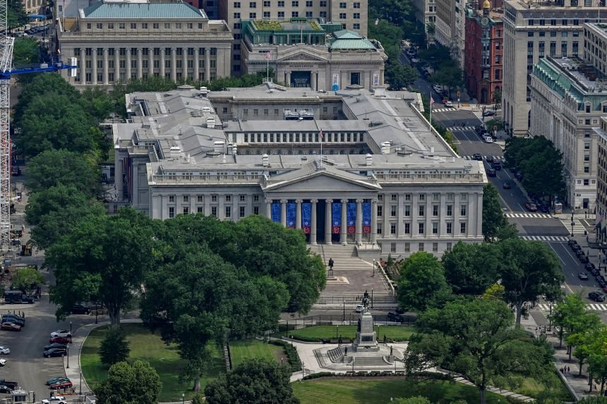 The Treasury building in Washington, DC, on July 11, 2026. The Treasury Department has sought to calm the market by increasing its regular buyback program to $6 billion.