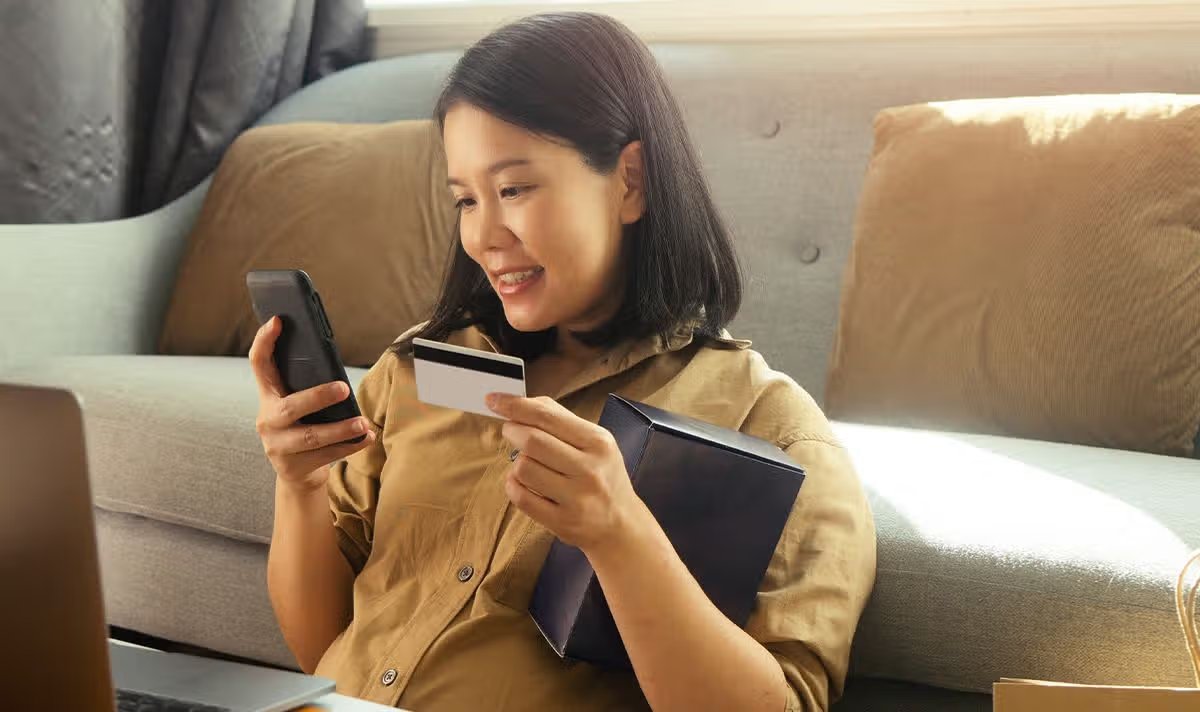 A woman checks her finances