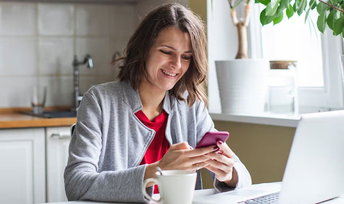 A woman checks her finances