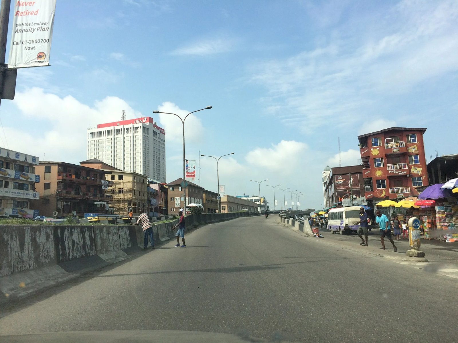 Road on Lagos Island leading towards the UBA House bank tower in Nigeria’s main financial district